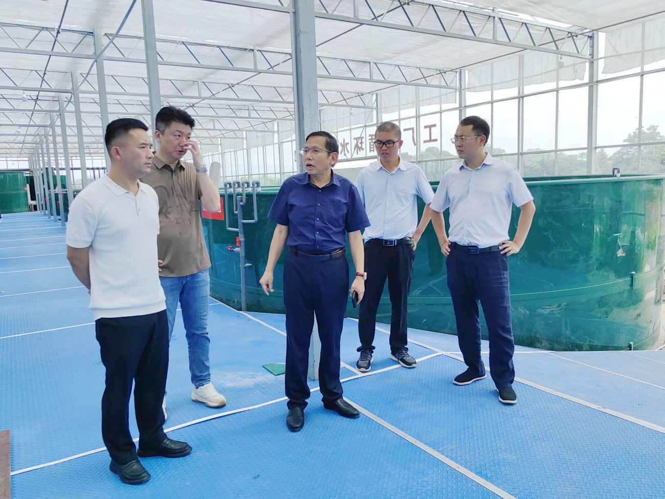 市农业科学院王建民一行到市九派城乡集团考察交流